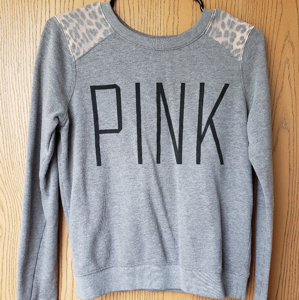 PINK sweater with leopard print shoulders